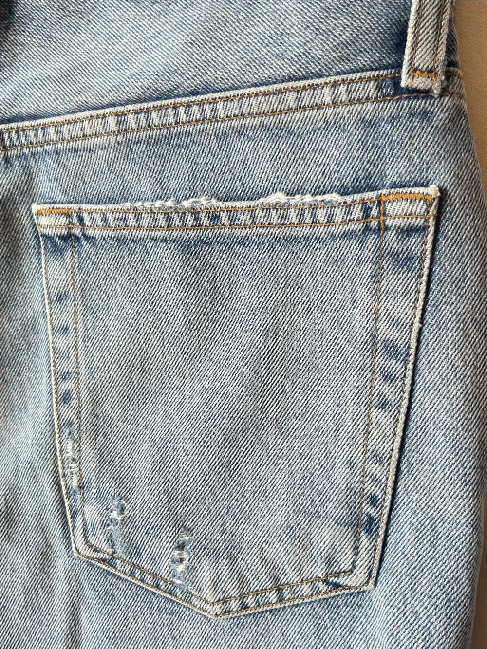 AGOLDE Riley cut off denim shorts 26 High rise Button fly Light wash Distressed